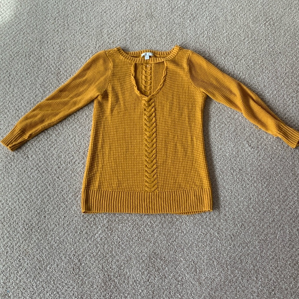 Really cute mustard yellow sweater.